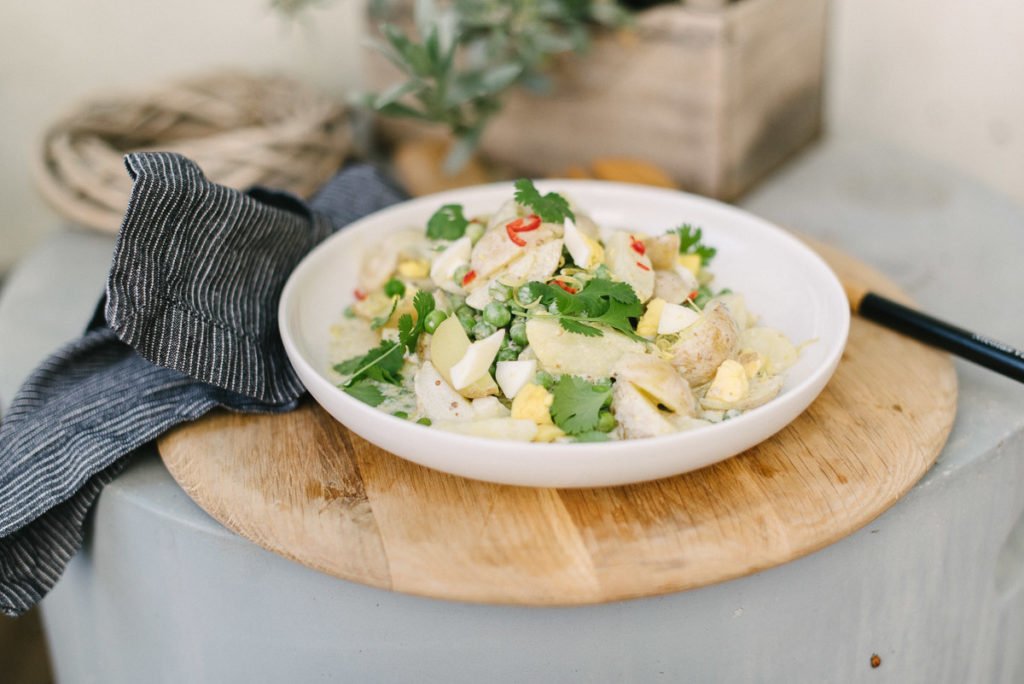 Rezept: Außergewöhnlicher Kartoffelsalat mit Erbsen und Koriander