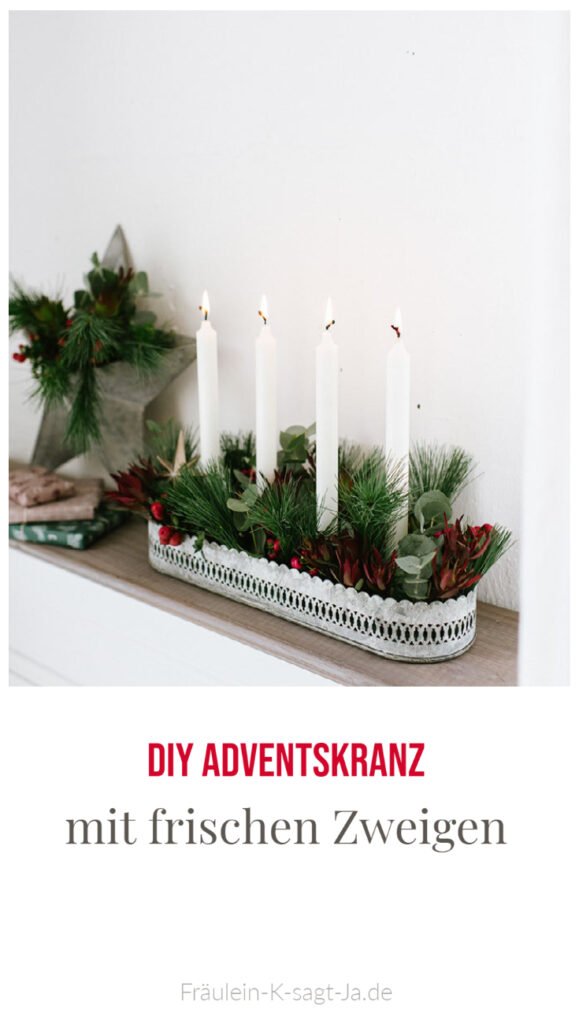 DIY Adventskranz mit Pflanzen für draußen weihnachtlich dekorieren mit grünen Zweigen und Beeren oder Olivenzweigen.