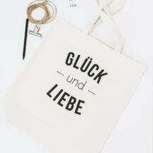 Cremefarbene Baumwolltasche mit Aufdruck Glück und Liebe